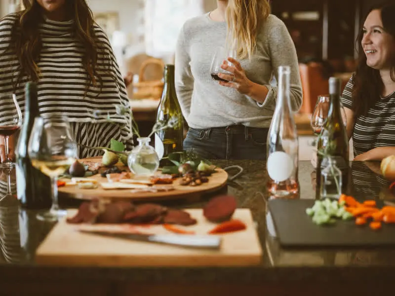 A group of people enjoying wine